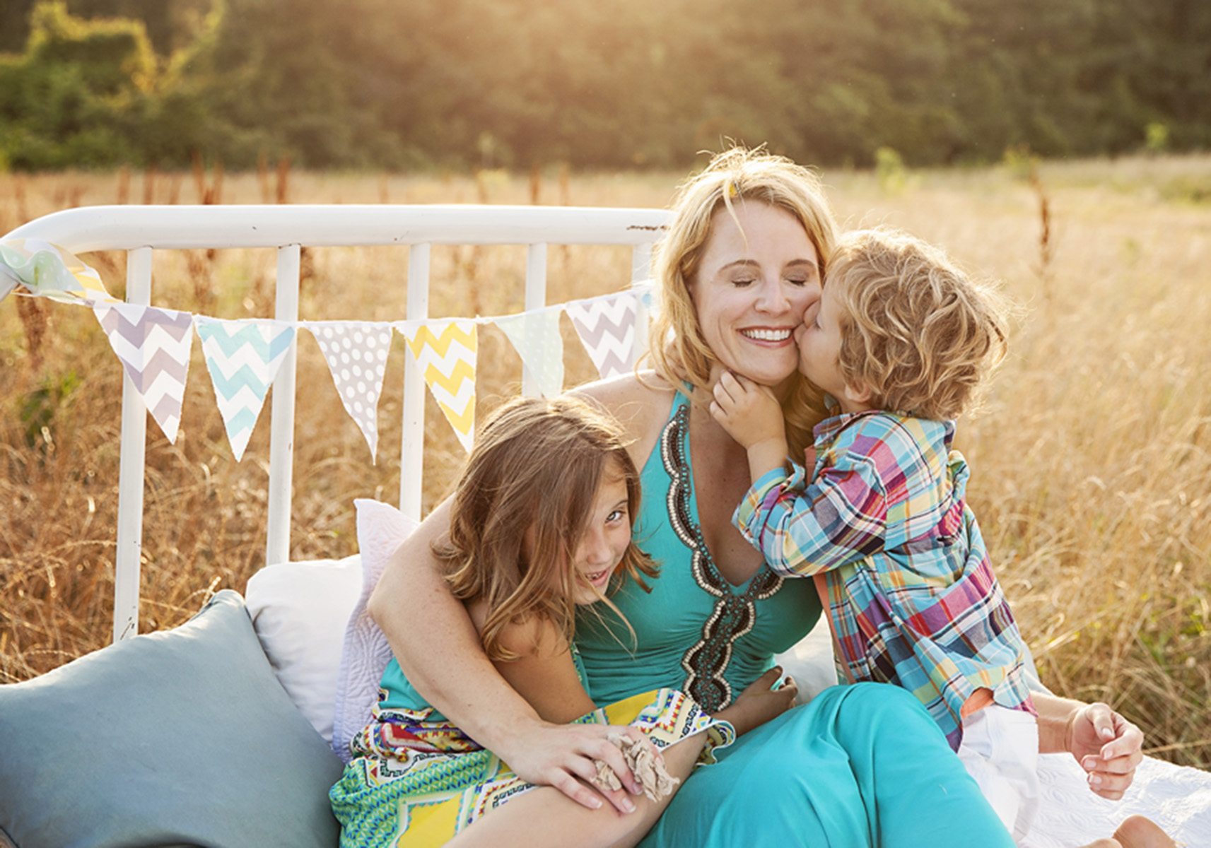 Outer Banks family photographer bed in field