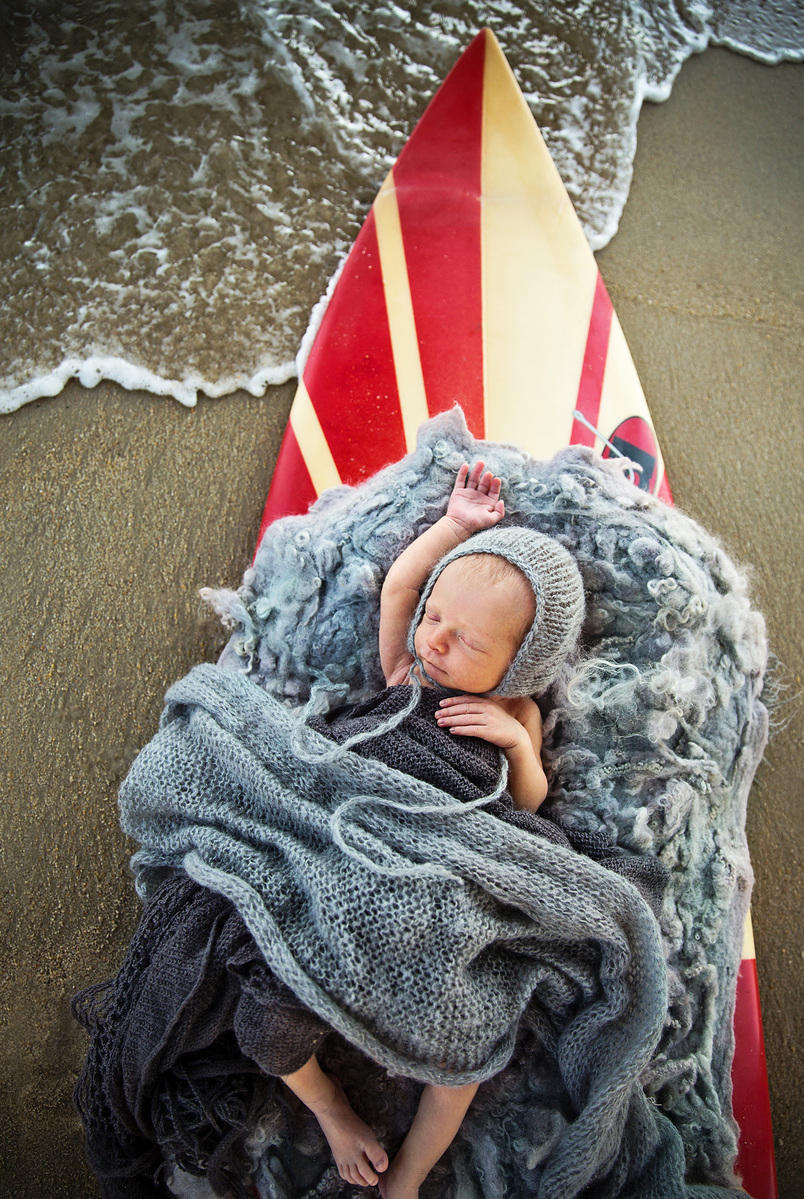 Newborn surfer photography at Kitty Hawk Pier