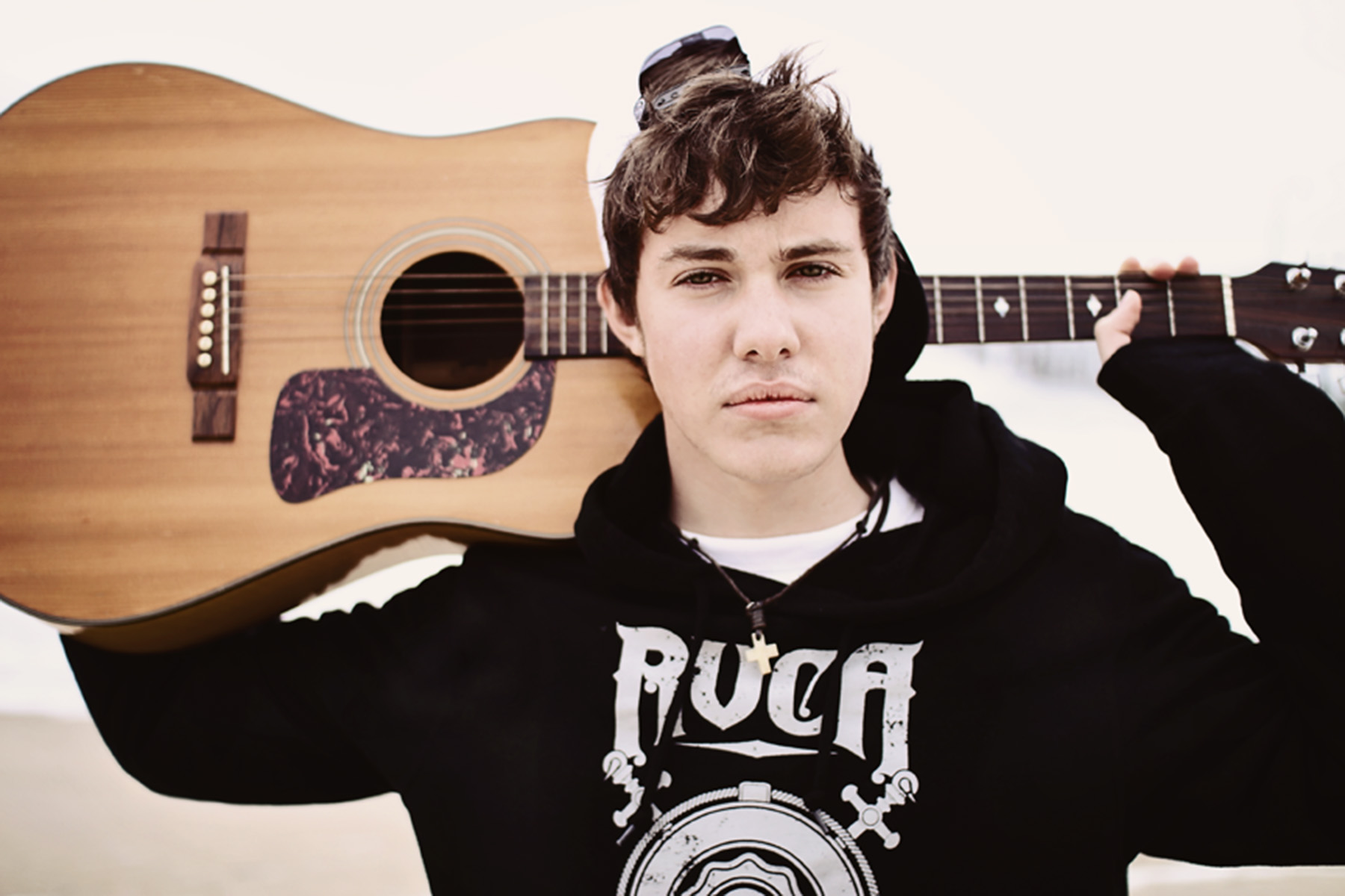 Senior boy with guitar, Nags Head, NC